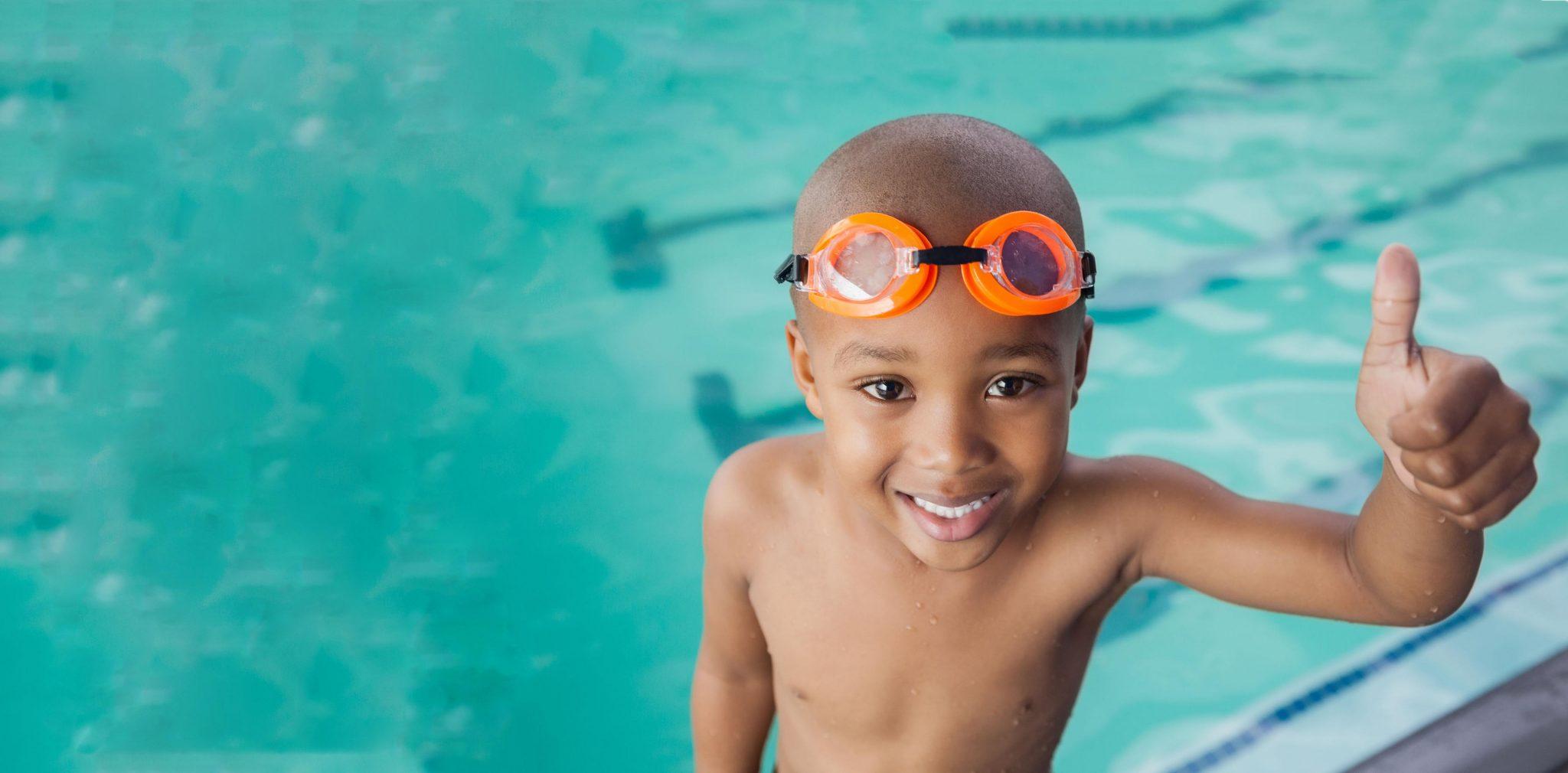 young male swimmer in goggles
