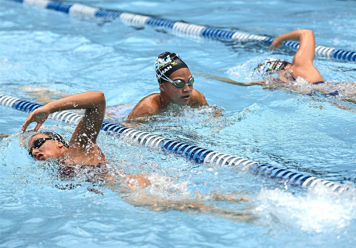 3 competitive youth swim team members